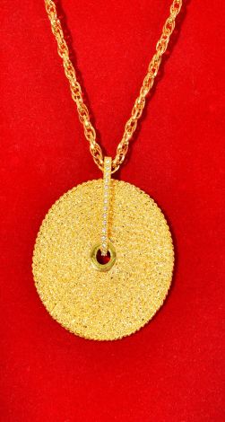 Pendant in the form of a circle with a chain
