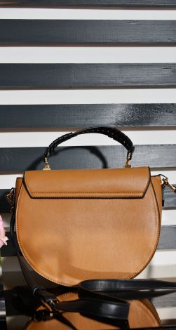 A beautiful handbag of a fashionable shape