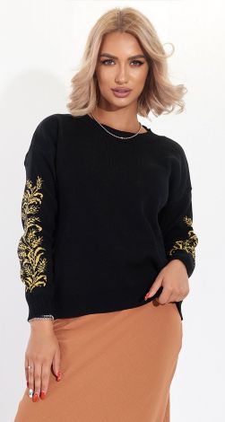 A beautiful sweater with an ornament on the sleeves