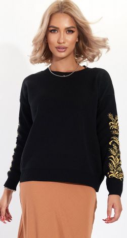 A beautiful sweater with an ornament on the sleeves