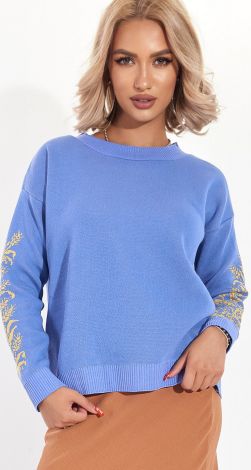 A beautiful sweater with an ornament on the sleeves