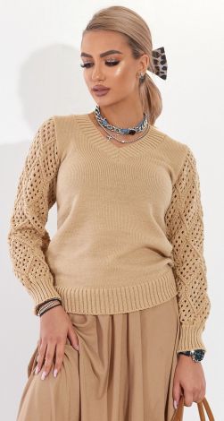 A beautiful sweater with an openwork sleeve