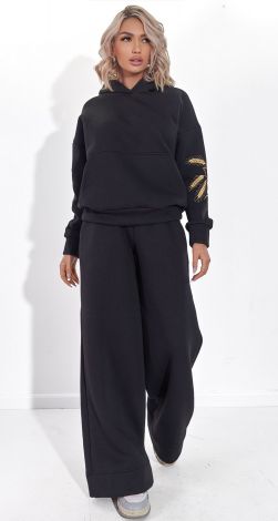 Костюми жіночі