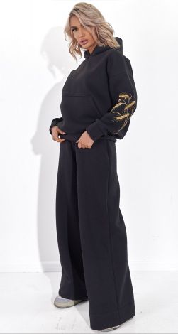 Костюми жіночі