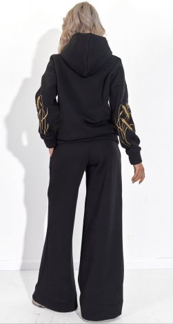 Костюми жіночі