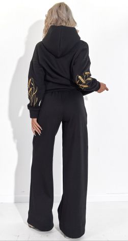 Костюми жіночі