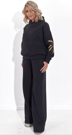 Костюми жіночі