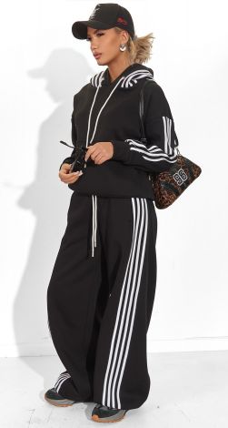 Костюми жіночі