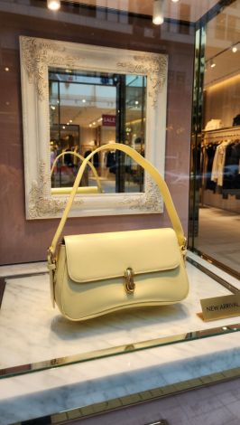 Солнечный акцент: Сумочка в оттенке «нежный лимон»
