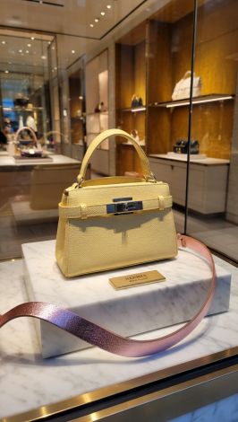 A small yellow handbag