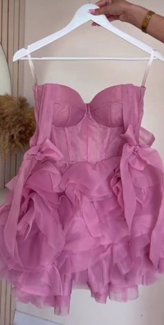A luxurious pink corset mini dress with a full skirt and bow ties - Image 5
