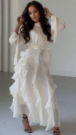 A luxurious, weightless white dress with ruffles