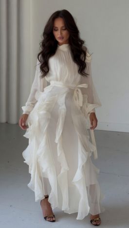 A luxurious, weightless white dress with ruffles