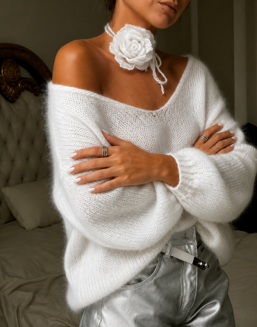 A soft white oversized sweater