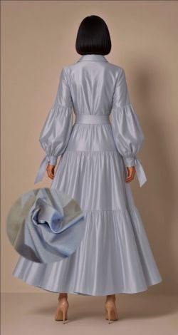 A luxurious and stylish gray shirt dress with puff sleeves and ties