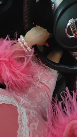 Pink mini evening dress in premium double-knit fabric with ostrich feather sleeves