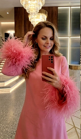 Pink mini evening dress in premium double-knit fabric with ostrich feather sleeves