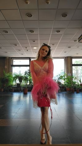Pink mini evening dress in premium double-knit fabric with ostrich feather sleeves