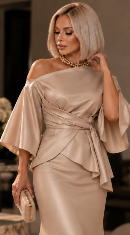 A milky gold evening two-piece set made from shimmering stretch fabric: a draped wrap blouse and a maxi skirt
