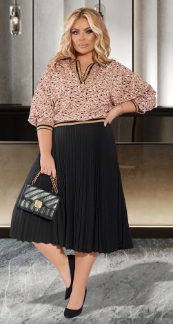 A blouse with a pleated skirt