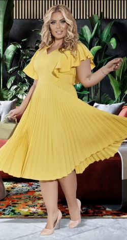 A luxurious yellow pleated dress with a flowing skirt and elegant ruffles