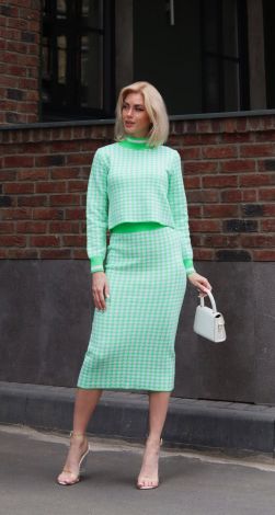 Knitted suit with a skirt