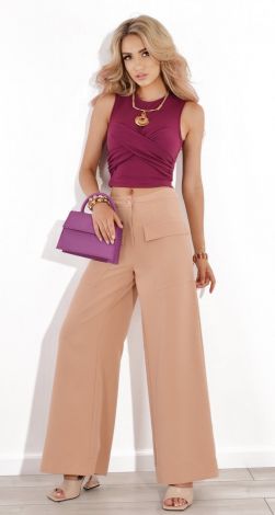 Beige flared trousers with large pockets